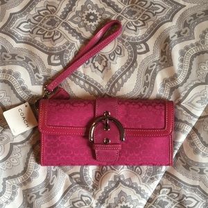 Coach pink wristlet wallet
